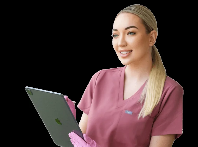 Cloud Aesthetics staff member with an iPad