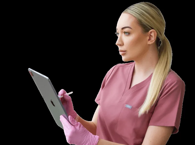 Cloud Aesthetics cosmetic nurse with iPad and stylus